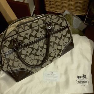 Barely used Coach purse with dust bag